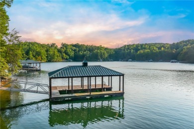 Set along the shores of a calm, emerald-green Lake Keowee Cove on The Cliffs At Keowee Falls in South Carolina - for sale on GolfHomes.com, golf home, golf lot