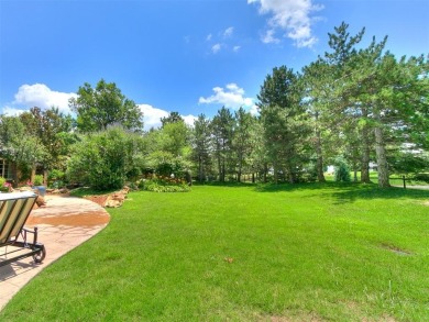 Welcome to this stately 5-bedroom, 5-bathroom custom-built home on Gaillardia Country Club in Oklahoma - for sale on GolfHomes.com, golf home, golf lot