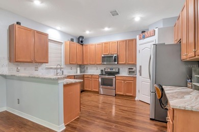 Experience the ideal combination of elegance, comfort, and on Heritage Harbor Golf and Country Club in Florida - for sale on GolfHomes.com, golf home, golf lot