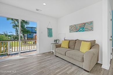 Welcome to 122 SE 2nd Street-Your Coastal Retreat Awaits! This on Founders Club At St. James Plantation in North Carolina - for sale on GolfHomes.com, golf home, golf lot