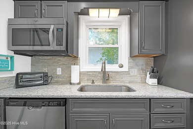 Welcome to 122 SE 2nd Street-Your Coastal Retreat Awaits! This on Founders Club At St. James Plantation in North Carolina - for sale on GolfHomes.com, golf home, golf lot