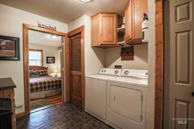 Charming In-Town McCall Retreat with Rustic Flair! Step into the on McCall Municipal Golf Course in Idaho - for sale on GolfHomes.com, golf home, golf lot