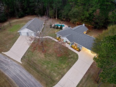 Discover your lakeside gem, a charming 3-bed, 2-bath home on on Rayburn Country Club in Texas - for sale on GolfHomes.com, golf home, golf lot