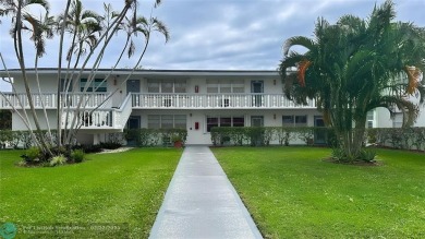 Bright  Spacious First-Floor Corner Unit! This 2-bedroom, 1 on Hillsboro Pines Golf in Florida - for sale on GolfHomes.com, golf home, golf lot