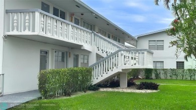 Bright  Spacious First-Floor Corner Unit! This 2-bedroom, 1 on Hillsboro Pines Golf in Florida - for sale on GolfHomes.com, golf home, golf lot