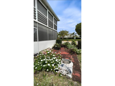 SELLER MOTIVATED. Bright & Spacious First-Floor Corner Unit! on Hillsboro Pines Golf in Florida - for sale on GolfHomes.com, golf home, golf lot