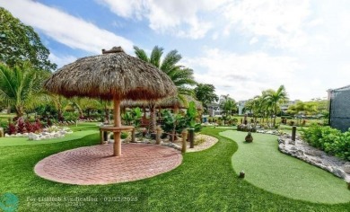 Bright  Spacious First-Floor Corner Unit! This 2-bedroom, 1 on Hillsboro Pines Golf in Florida - for sale on GolfHomes.com, golf home, golf lot