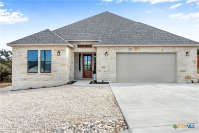 Prepare to be amazed by this stunning home built by ACH Homes on Vaaler Creek Golf Club in Texas - for sale on GolfHomes.com, golf home, golf lot