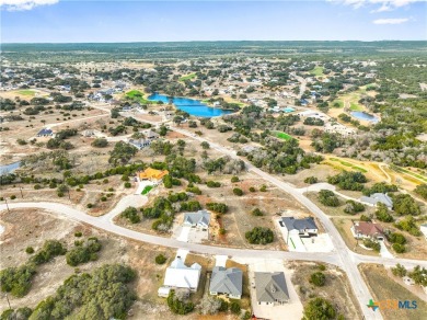 Prepare to be amazed by this stunning home built by ACH Homes on Vaaler Creek Golf Club in Texas - for sale on GolfHomes.com, golf home, golf lot