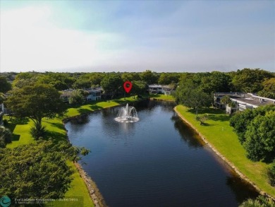 LOOK AT THIS GEM NESTLED IN PALM AIRE COUNTRY CLUB!! ALL AGES on Palm-Aire Country Club and Resort - The Oaks in Florida - for sale on GolfHomes.com, golf home, golf lot