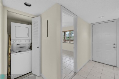 This 'JUNIPER' FLOOR PLAN HAS INSIDE WASHER/DRYER, UPDATED on Wynmoor Golf Course in Florida - for sale on GolfHomes.com, golf home, golf lot
