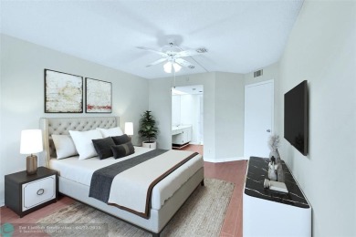 This 'JUNIPER' FLOOR PLAN HAS INSIDE WASHER/DRYER, UPDATED on Wynmoor Golf Course in Florida - for sale on GolfHomes.com, golf home, golf lot