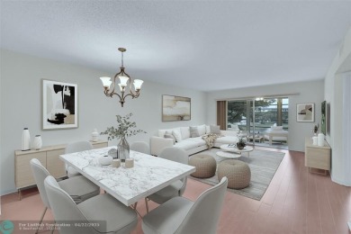 This 'JUNIPER' FLOOR PLAN HAS INSIDE WASHER/DRYER, UPDATED on Wynmoor Golf Course in Florida - for sale on GolfHomes.com, golf home, golf lot