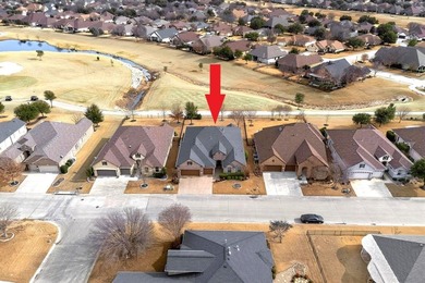 Experience golf course living at its finest in this beautifully on Wildhorse Golf Club of Robson Ranch in Texas - for sale on GolfHomes.com, golf home, golf lot