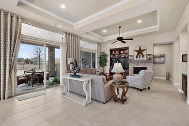 Experience golf course living at its finest in this beautifully on Wildhorse Golf Club of Robson Ranch in Texas - for sale on GolfHomes.com, golf home, golf lot