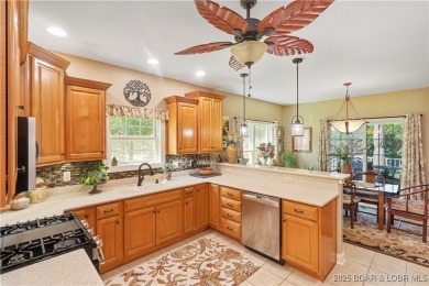 Live the maintenance-free dream in Porto Cima! This beautifully on The Club At Porto Cima in Missouri - for sale on GolfHomes.com, golf home, golf lot