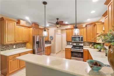 Live the maintenance-free dream in Porto Cima! This beautifully on The Club At Porto Cima in Missouri - for sale on GolfHomes.com, golf home, golf lot