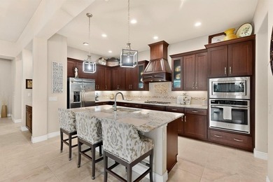 Experience golf course living at its finest in this beautifully on Wildhorse Golf Club of Robson Ranch in Texas - for sale on GolfHomes.com, golf home, golf lot