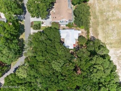 Welcome to 706 OYSTER BAY DRIVE located in the highly sought on Sea Trail Golf Resort in North Carolina - for sale on GolfHomes.com, golf home, golf lot