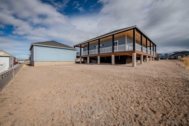 Welcome to your dream home, blending modern comfort with rustic on Canyon Breeze Golf Course in Utah - for sale on GolfHomes.com, golf home, golf lot