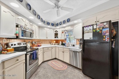 Welcome to 706 OYSTER BAY DRIVE located in the highly sought on Sea Trail Golf Resort in North Carolina - for sale on GolfHomes.com, golf home, golf lot