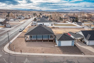 Welcome to your dream home, blending modern comfort with rustic on Canyon Breeze Golf Course in Utah - for sale on GolfHomes.com, golf home, golf lot