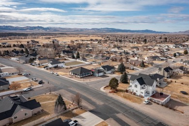 Welcome to your dream home, blending modern comfort with rustic on Canyon Breeze Golf Course in Utah - for sale on GolfHomes.com, golf home, golf lot