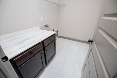 Tired of cookie-cutter homes? This stunning new construction by on Fairfield Plantation Golf and Country Club in Georgia - for sale on GolfHomes.com, golf home, golf lot