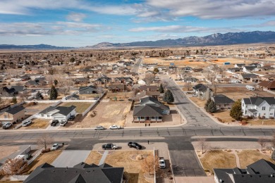 Welcome to your dream home, blending modern comfort with rustic on Canyon Breeze Golf Course in Utah - for sale on GolfHomes.com, golf home, golf lot