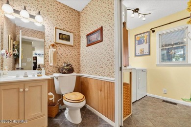 Welcome to 706 OYSTER BAY DRIVE located in the highly sought on Sea Trail Golf Resort in North Carolina - for sale on GolfHomes.com, golf home, golf lot