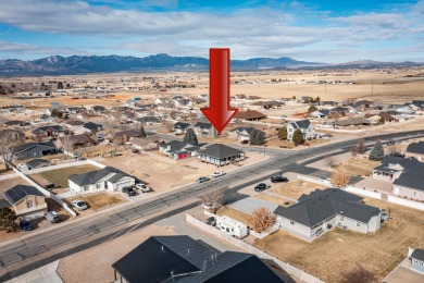 Welcome to your dream home, blending modern comfort with rustic on Canyon Breeze Golf Course in Utah - for sale on GolfHomes.com, golf home, golf lot