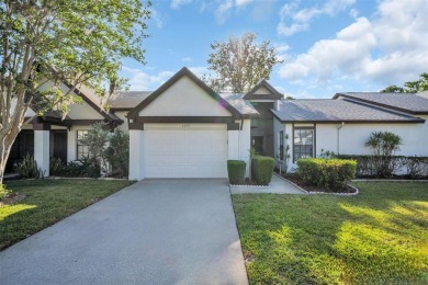 Beautiful and spacious 2-bedroom, 2-bath Camelot Village villa on Highland Lakes Executive Golf Course in Florida - for sale on GolfHomes.com, golf home, golf lot