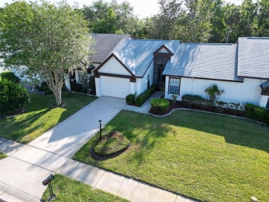 Beautiful and spacious 2-bedroom, 2-bath Camelot Village villa on Highland Lakes Executive Golf Course in Florida - for sale on GolfHomes.com, golf home, golf lot