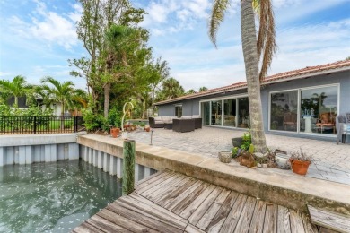 WONDERFUL FLORIDA STYLE COUNTRY CLUB SHORES canal FRONT home and on Links on Longboat Golf Club in Florida - for sale on GolfHomes.com, golf home, golf lot