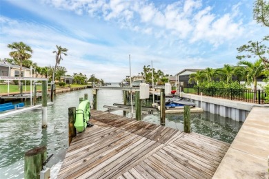 WONDERFUL FLORIDA STYLE COUNTRY CLUB SHORES canal FRONT home and on Links on Longboat Golf Club in Florida - for sale on GolfHomes.com, golf home, golf lot