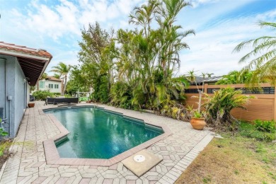 WONDERFUL FLORIDA STYLE COUNTRY CLUB SHORES canal FRONT home and on Links on Longboat Golf Club in Florida - for sale on GolfHomes.com, golf home, golf lot