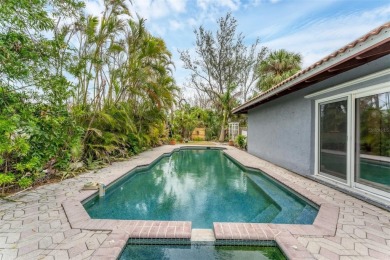 WONDERFUL FLORIDA STYLE COUNTRY CLUB SHORES canal FRONT home and on Links on Longboat Golf Club in Florida - for sale on GolfHomes.com, golf home, golf lot