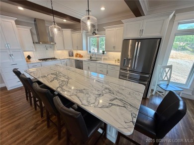 Introducing East Villages! An exquisite lakefront property on The Club At Porto Cima in Missouri - for sale on GolfHomes.com, golf home, golf lot