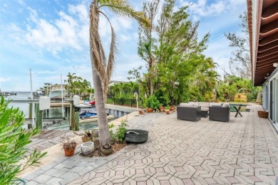 WONDERFUL FLORIDA STYLE COUNTRY CLUB SHORES canal FRONT home and on Links on Longboat Golf Club in Florida - for sale on GolfHomes.com, golf home, golf lot