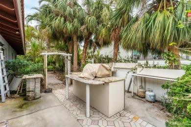 WONDERFUL FLORIDA STYLE COUNTRY CLUB SHORES canal FRONT home and on Links on Longboat Golf Club in Florida - for sale on GolfHomes.com, golf home, golf lot