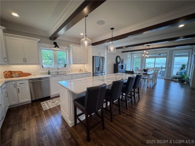 Introducing East Villages! An exquisite lakefront property on The Club At Porto Cima in Missouri - for sale on GolfHomes.com, golf home, golf lot