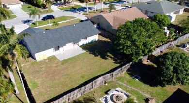 Say HELLO TO YOUR NEW HOME! This beautifully renovated 2,140 sq on Village Golf Club in Florida - for sale on GolfHomes.com, golf home, golf lot