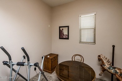 Take a look at this stunning RV garage home located in a private on London Bridge Golf Course in Arizona - for sale on GolfHomes.com, golf home, golf lot