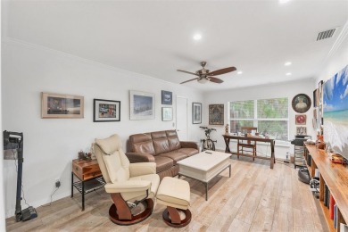 WONDERFUL FLORIDA STYLE COUNTRY CLUB SHORES canal FRONT home and on Links on Longboat Golf Club in Florida - for sale on GolfHomes.com, golf home, golf lot