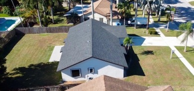 Say HELLO TO YOUR NEW HOME! This beautifully renovated 2,140 sq on Village Golf Club in Florida - for sale on GolfHomes.com, golf home, golf lot