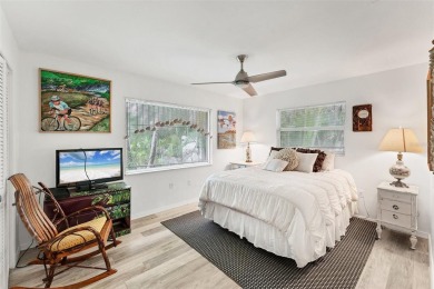 WONDERFUL FLORIDA STYLE COUNTRY CLUB SHORES canal FRONT home and on Links on Longboat Golf Club in Florida - for sale on GolfHomes.com, golf home, golf lot