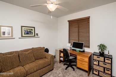 Take a look at this stunning RV garage home located in a private on London Bridge Golf Course in Arizona - for sale on GolfHomes.com, golf home, golf lot