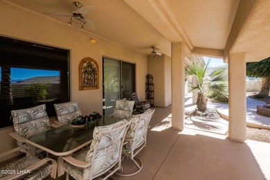 Take a look at this stunning RV garage home located in a private on London Bridge Golf Course in Arizona - for sale on GolfHomes.com, golf home, golf lot