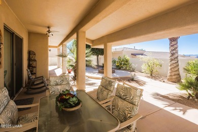 Take a look at this stunning RV garage home located in a private on London Bridge Golf Course in Arizona - for sale on GolfHomes.com, golf home, golf lot