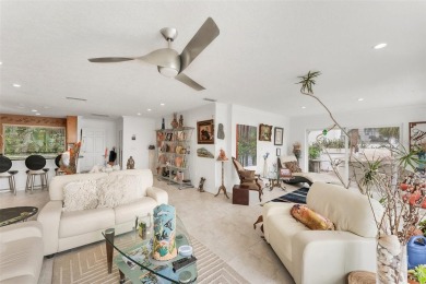 WONDERFUL FLORIDA STYLE COUNTRY CLUB SHORES canal FRONT home and on Links on Longboat Golf Club in Florida - for sale on GolfHomes.com, golf home, golf lot